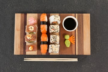Assorted sushi set served with chopsticks and soy sauce