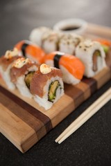 Assorted sushi set served on wooden board