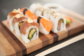 Assorted sushi set served on wooden board