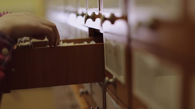 Search using the card index in the library