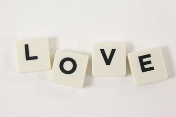 White blocks displaying love message