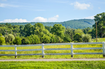 Virginia countryside in summer with fence and farms
