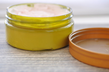 Large green jar with cream for body
