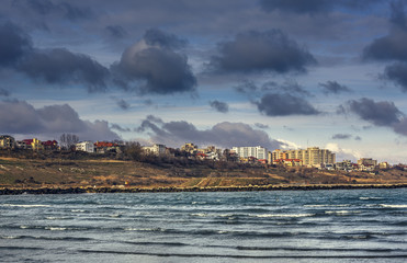 Seascape with residential district of Constanta city on the coast of the Black Sea, Romania.