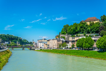 View of riverside of Salzach river in Salzburg, Austria.