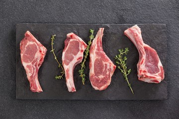 Rib chop and herb on black slate plate