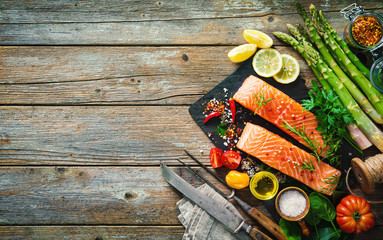 Fresh salmon fillet with aromatic herbs, spices and vegetables