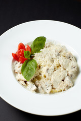 Fettuccine with chicken and mushrooms. Italian style. Italian food. Italian cuisine.