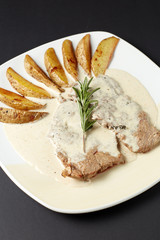 Beef in cognac sauce. Italian style. Italian food. Italian cuisine.