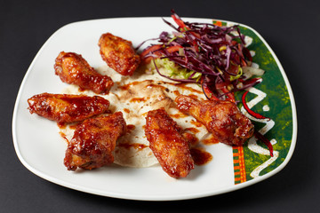 Chicken wings in Mexican style. Mexican food. Mexican cuisine.