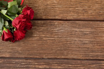 Bunch of red roses and gift box