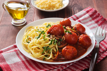Italian pasta with cherry tomato sauce and cheese