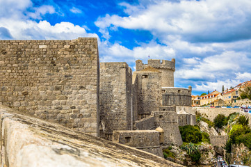 Fototapeta na wymiar City Walls Dubrovnik. / View at fortified city walls in old town Dubrovnik, famous touristic attraction in Europe, UNESCO World's Heritage Site.