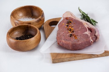 Sirloin chop, salt and black pepper