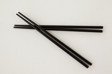Pair of two black chopsticks