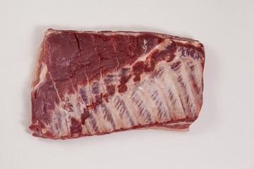 Beef brisket against white background