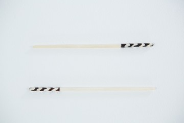 Chopsticks on white background