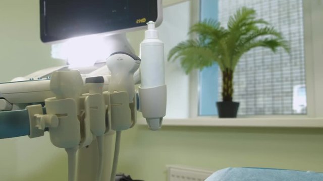 Doctor doing 3d ultrasound on belly of t woman in clinic 4k