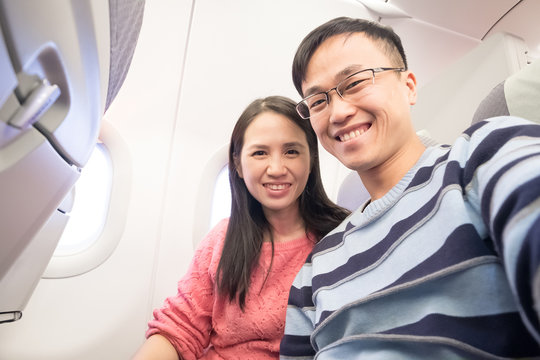 couple selfie in airplane