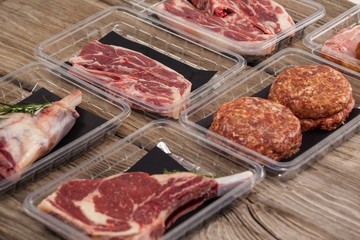 Varieties of meat in plastic boxes