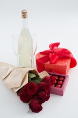 Gift, chocolate box, roses and champagne bottle