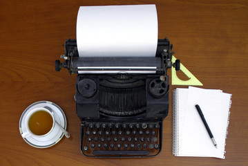 Retro writing machine with style keyboard. Obsolete typewriter. 