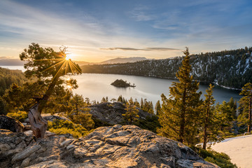 Emerald Bay on Lake Tahoe with snow on mountains - obrazy, fototapety, plakaty