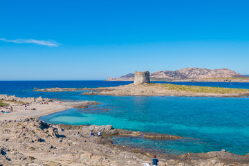 Fototapeta na wymiar Beautiful turquoise blue mediterranean Pelosa beach near Stintino, Sardinia, Italy.