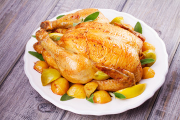 Chicken with Lemon, Lime and Potato Garnished with Sage