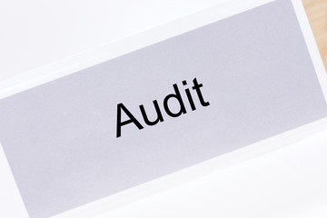 Office folder with the label audit on white background
