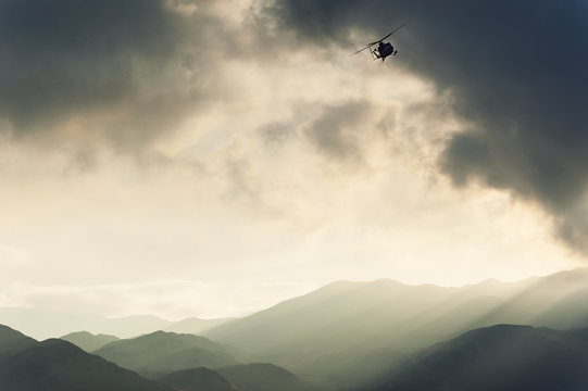 Military helicopter taking of at sunrise over the Atacama Desert in Antofagasta, Chile
