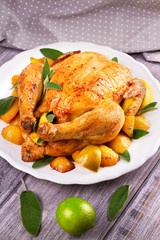Chicken with Lemon, Lime and Potato Garnished with Sage