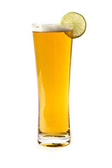 a glass of light beer and juicy lime on a white background