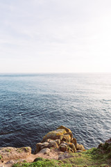 Ocean view with rocks at coast Cornwall
