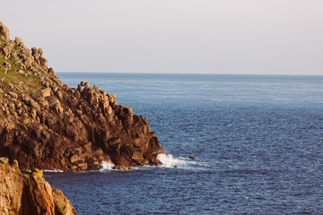 Ocean view with rocks at coast Cornwall
