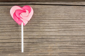 Close-up of pink heart shaped lollipop