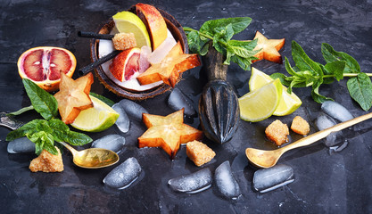 Collage with drink of tropical fruits