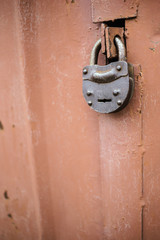 The old door locked with a padlock hanging brackets. Set of backgrounds