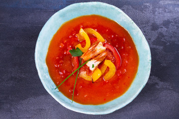 Shrimp Gazpacho. Spanish soup. Vegetable puree with prawns. View from above, top studio shot