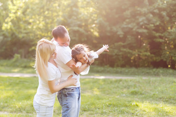 Fototapeta premium happy family having fun outdoors