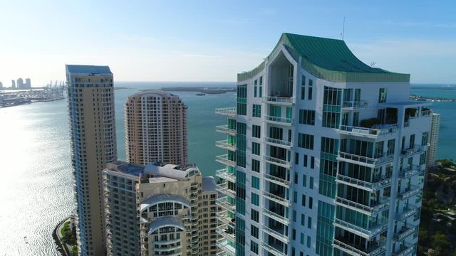 Aerial static simulated view of highrise buildings on Brickell Key
