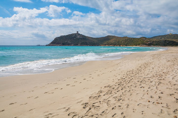Rocks in crystal clear sea water of Villasimius beach, Sardinia island, Italy