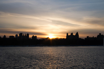 Fototapeta na wymiar Sunset reflects on the lake in New York