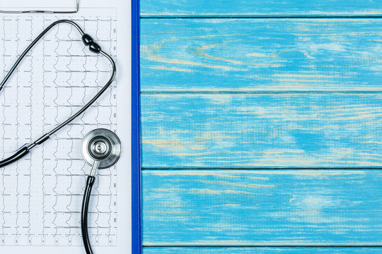 Medical concept on a blue wooden background.