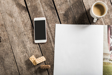 Blank book or magazine cover on wood background