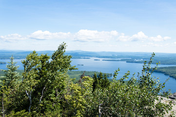 Fototapeta na wymiar Idyllic view of Lake Winnipesaukee, Mount Major in Maine, USA