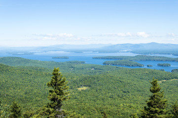 Fototapeta na wymiar Idyllic view of Lake Winnipesaukee, Mount Major in Maine, USA