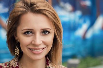 Obraz premium Portrait of young european female with bob cut hair style. Smiling woman. Happiness