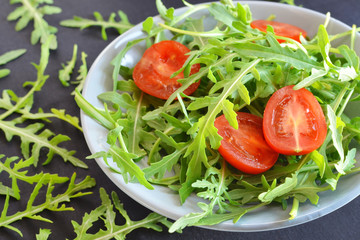 tomatoes with fresh arugula
