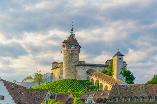The munot fortress in the swiss city schaffhausen is reflected on the rhine river during sunset in summer.